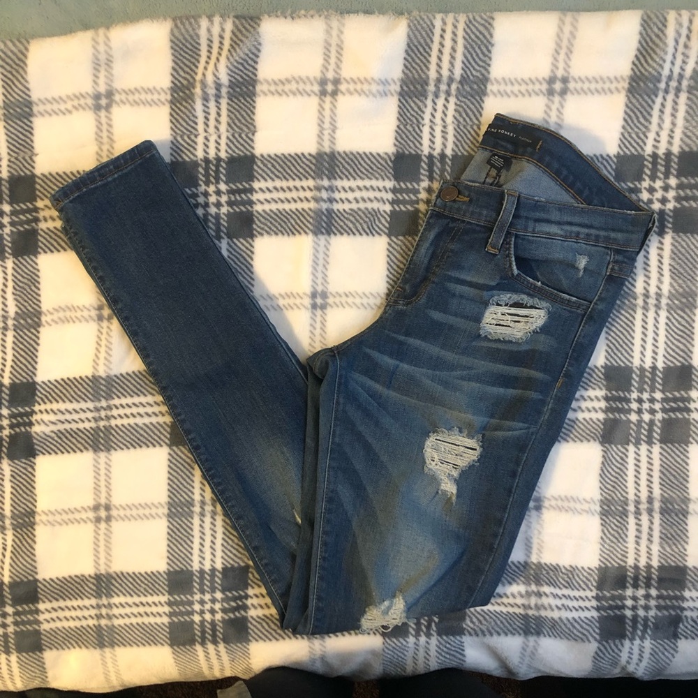 Flying money distressed skinny jeans size 27